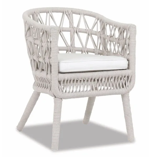 Dana Rope Dining Chair with curved back, sloped arms, macramé-style woven natural linen olefin rope on aluminum frame