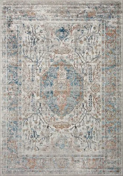 Power-loomed Bianca Stone Multi Rug with vintage faded medallion pattern in blues, beiges, and rust tones