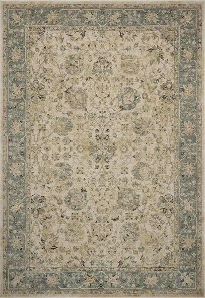 Briar Porcelain Coast Rug with traditional floral motifs, vintage-style texture, and muted blue-green border