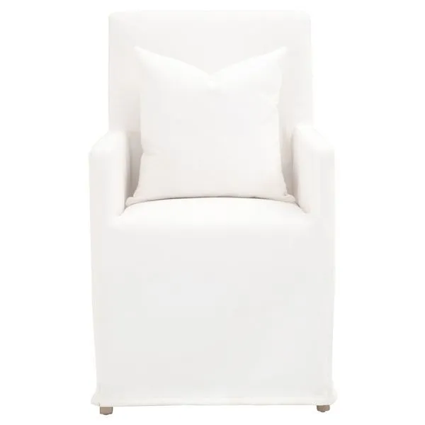 Classic white Shelter Slipcover Arm Chair with form-fitting skirted slipcover and matching pillow