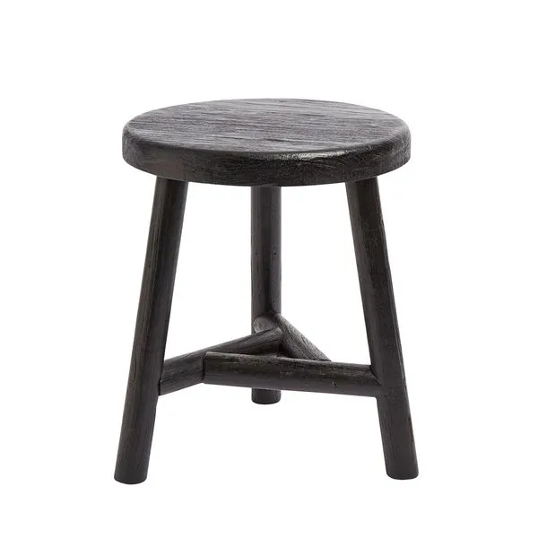Benji Stool handcrafted from dark stained wood with a round top and three angled legs connected by a triangular stretcher