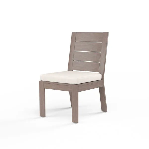 Laguna Armless Dining Chair with hand-brushed aluminum frame in driftwood finish and beige cushion
