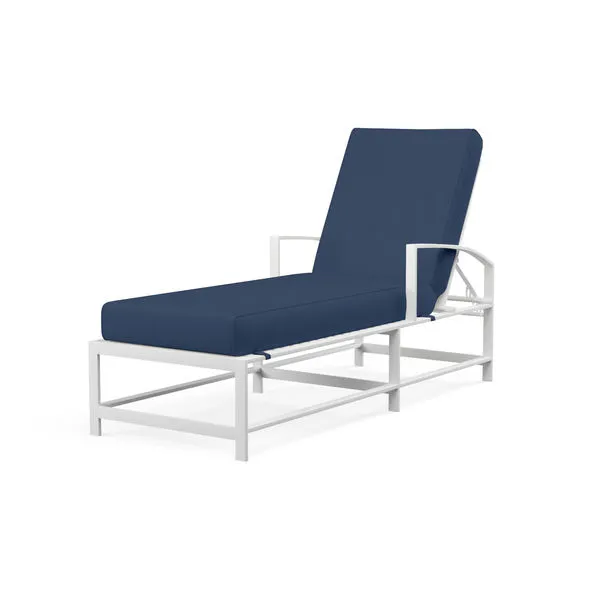 Bristol Chaise outdoor lounger with white aluminum frame, navy blue cushioned seat and adjustable backrest