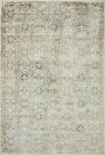 Sonnet Lagoon Gold round traditional rug with a muted color palette of blues, golds, and grays and an intricate artistic p...