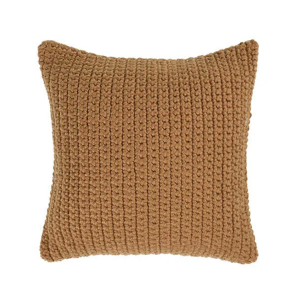 Square outdoor throw pillow with handwoven knit pattern in warm brown color