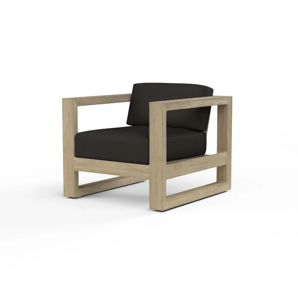 Coastal Teak Club Chair with solid teak wood frame in warm grey finish and black charcoal cushions