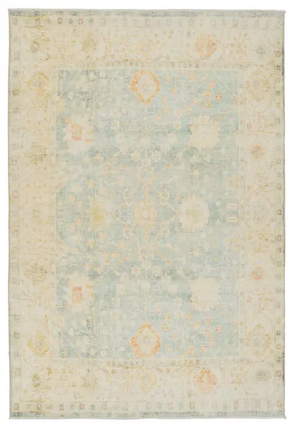 Lovato Floral Blue/Green Rug with vintage Persian-inspired floral pattern in light blue, pastel green, and cream tones wit...