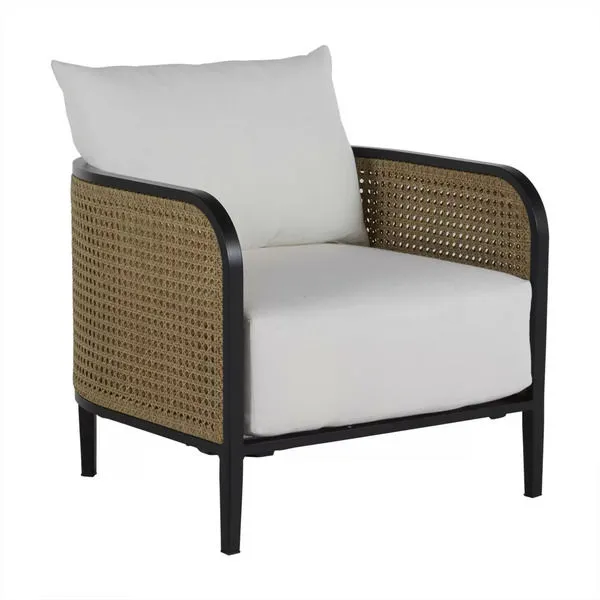 Havana lounge chair with black frame, natural resin woven sides, and white cushions
