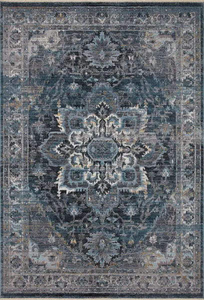 Full top-down view of Samra denim rug revealing central medallion and detailed border in muted blue and grey