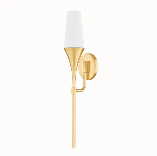 Side view showing profile of sconce with rounded wall plate and curved arm in aged brass