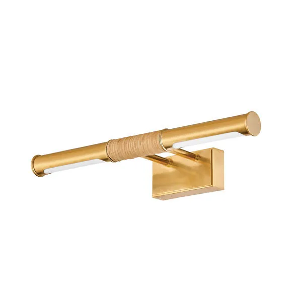 Small aged brass picture light with a cylindrical bar wrapped in rattan around center and rectangular mounting plate
