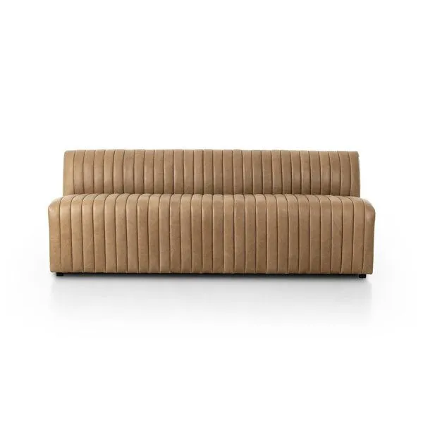 Armless dining banquette with tan top-grain leather featuring pronounced linear channeling