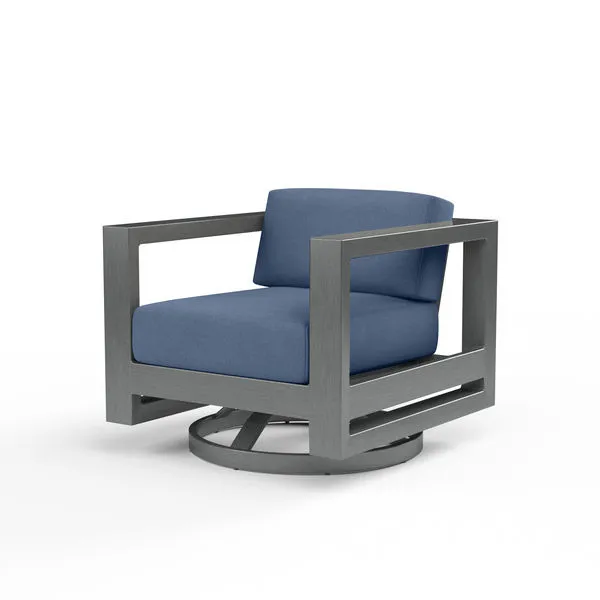 Redondo Swivel Club chair with powder-coated aluminum frame and blue cushions in mid-century modern style