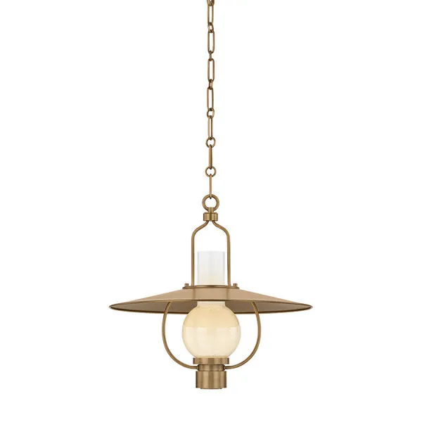 Cahill Lantern pendant with wide Patina Brass metal shade and opal seedy glass globe suspended by chain