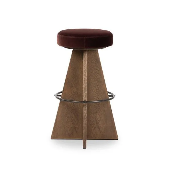 Damon Surrey Plum swivel bar stool with plush round plum-colored upholstered seat, tapered wood base, and metal footrest
