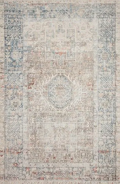 top-down view showing full rectangular rug with intricate classic medallion design in muted tones