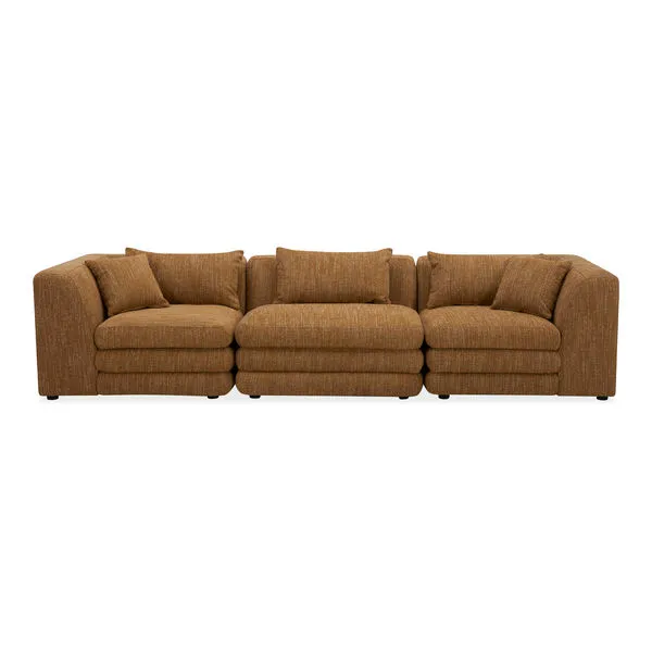 Lowtide Linear Modular Sectional in textured brown fabric with 1970s inspired layered cushions and multiple seat configura...