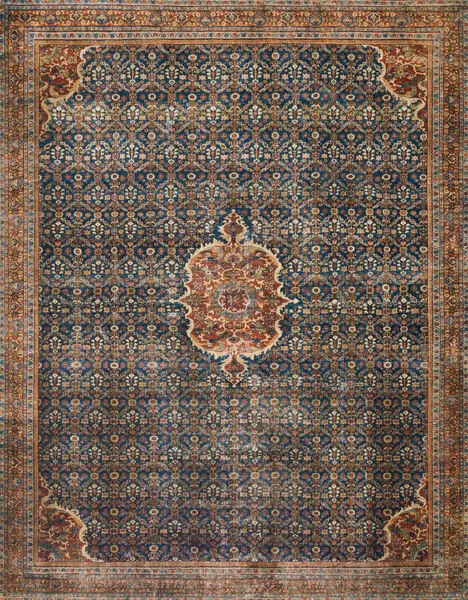 Layla rug with cobalt blue field and spice-colored medallions, traditional vintage design with intricate floral motifs