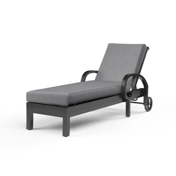 Monterey Chaise Lounge with espresso powder coated aluminum frame, curled arms, cross back, and gray cushion