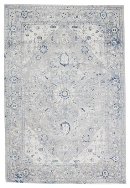 Rectangular traditional rug with center medallion and floral motifs in light gray, ivory, and dark blue