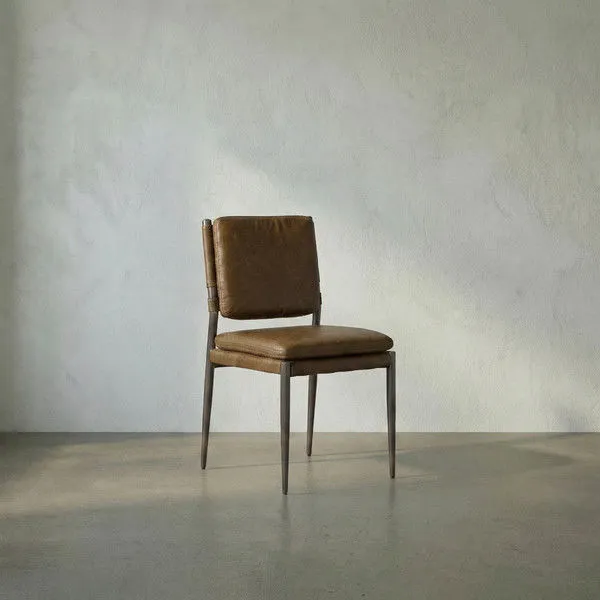 Industrial dining chair with steel gray powder coat frame and top-grain Ebony Black leather seat and back