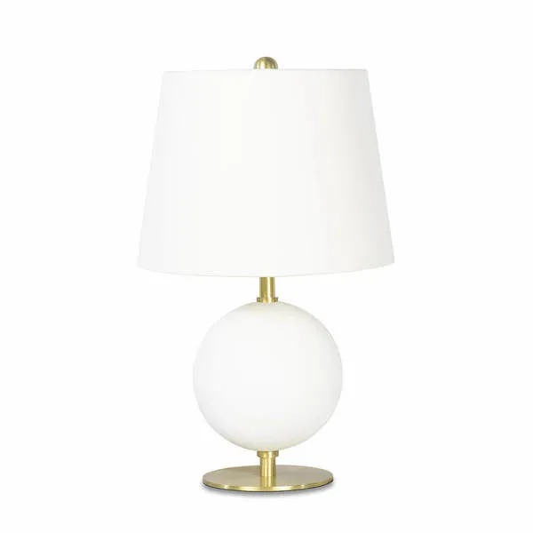 Compact table lamp with white spherical metal base, natural brass finish, and tall natural linen shade