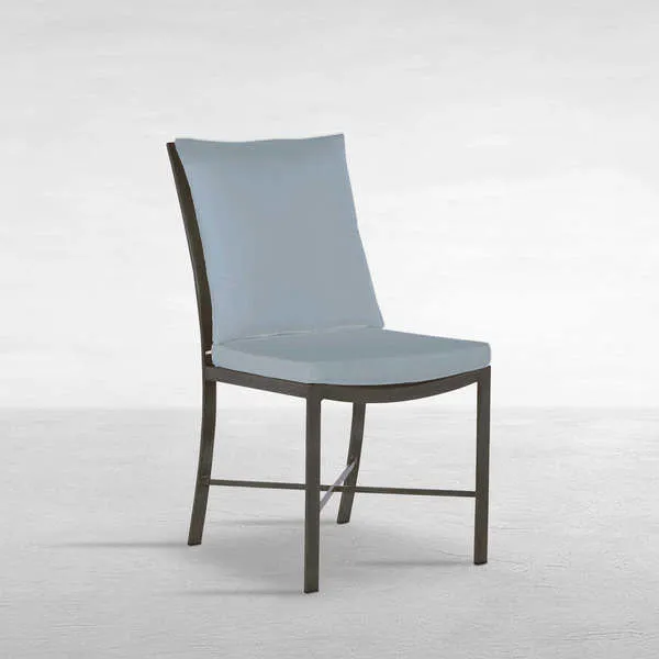 Monaco Aluminum Outdoor Side Chair with slender X-design dark frame and light blue padded cushions