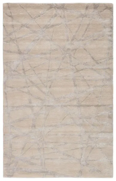 Modern hand-tufted abstract rug with intersecting silver gray lines over a soft white-gray viscose and wool blend