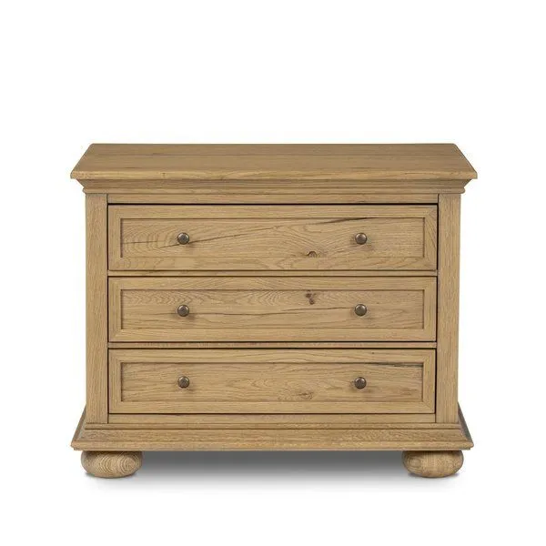 Light worn oak Geoffrey Veneer Nightstand with three drawers, bun feet, bronzed iron hardware, and visible natural grain