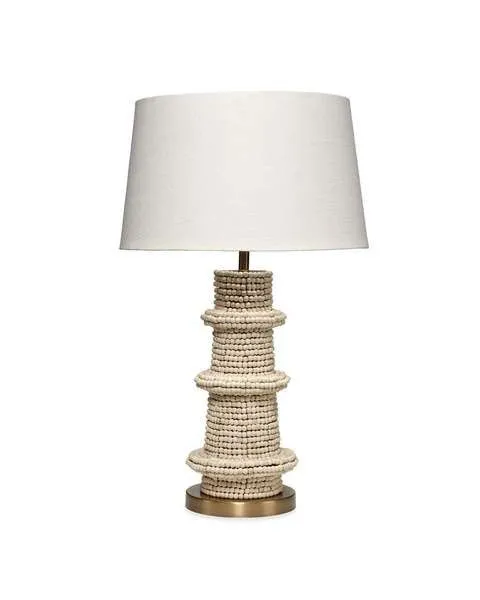 Rowan Table Lamp with artisan carved mango wood bead base in stacked cylindrical tiers and white fabric shade