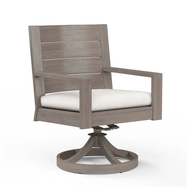 Laguna swivel dining chair in weathered driftwood finish with light beige cushion and aluminum frame