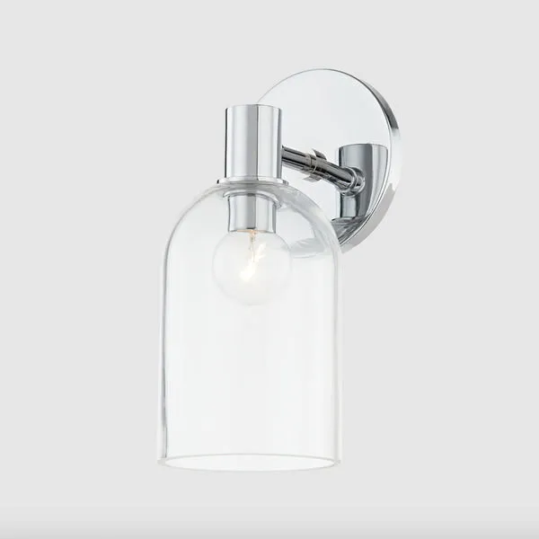Single light paisley bath sconce in polished chrome finish with clear bell-shaped glass shade