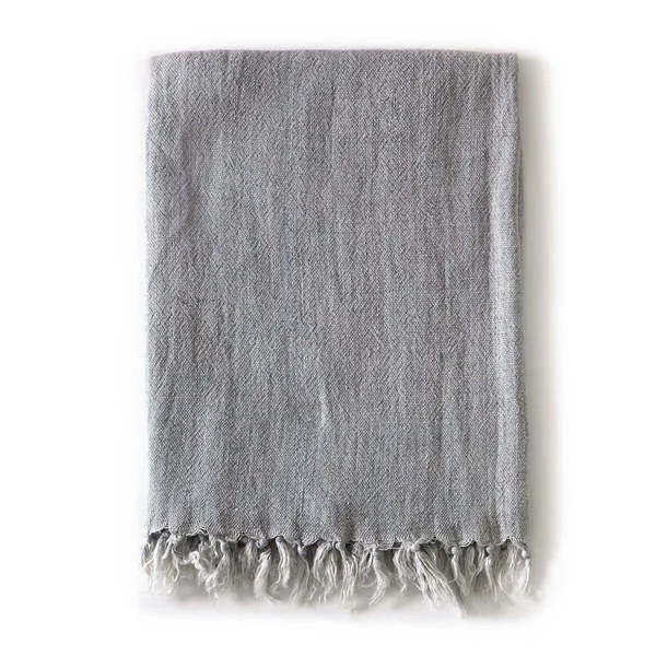 Ocean blue Montauk Linen King Blanket with natural linen texture and tassels on short edges