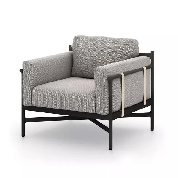 Hearst Outdoor Chair in dark bronze aluminum frame with textured ash gray cushions and ivory strapping detail