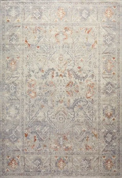 Flat lay of Rosemarie rug with full rectangular shape and antique-inspired ornate floral design in muted colors