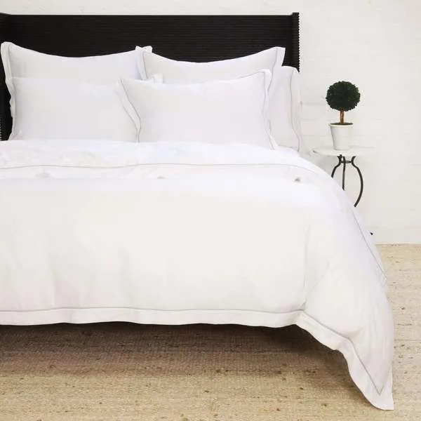 Seaglass green Sheena Bamboo Sateen Duvet Set on queen bed with matching pillow shams, simple clean style