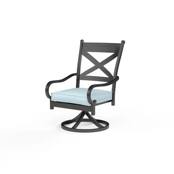 Monterey Swivel Dining Chair with dark espresso aluminum frame, X-back design, curved armrests, and light blue cushion