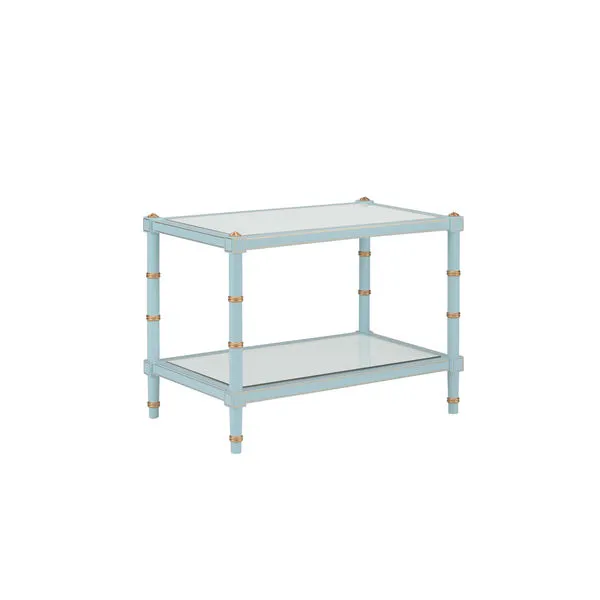 Rectangular blue Conner Cane Cocktail Table with gold bamboo-inspired leg accents and glass top and shelf