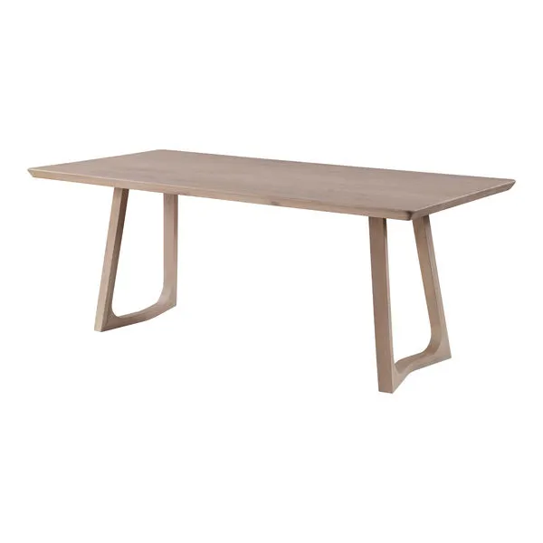 Silas Dining Table made from solid white oak with whitewash finish, featuring an airy base and long rectangular tabletop