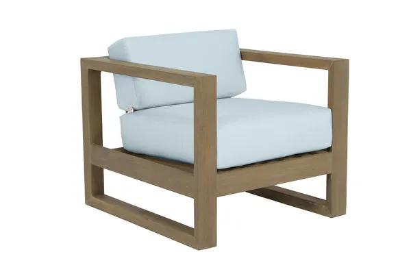 Coastal Teak Club Chair with solid teak frame and light blue cushions, warm grey wood finish, modern outdoor accent chair