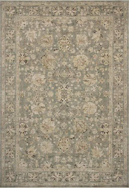 Briar Dune Mist traditional area rug with muted floral motifs, vintage-style texture, and a soft blue-gray palette