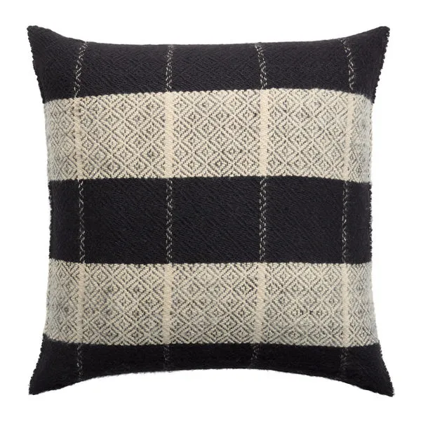 Square black and natural color pillow with embroidered geometric diamond pattern and stonewashed texture