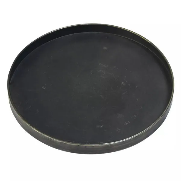 Dark black galvanized round tray with subtle brass rim and low sides