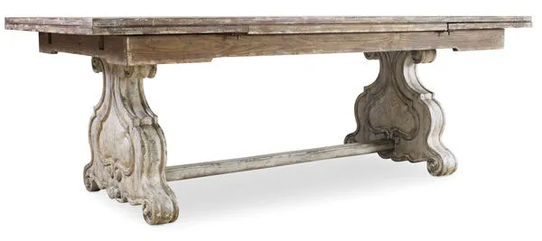 Rectangular trestle dining table with ornate vintage white base and natural wood tabletop with two 22-inch leaves