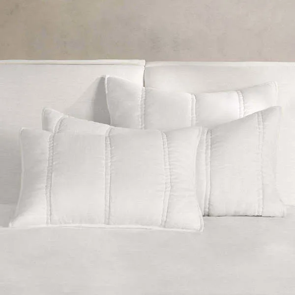 Rowen Sustainable Fabric Cloud White Sham with hand-quilted channel stitching on cloud white ramie fabric