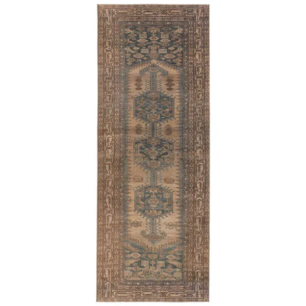 Southwestern runner rug with mini-medallions in brown, blue, and tan geometric patterns, size 3 by 10 feet