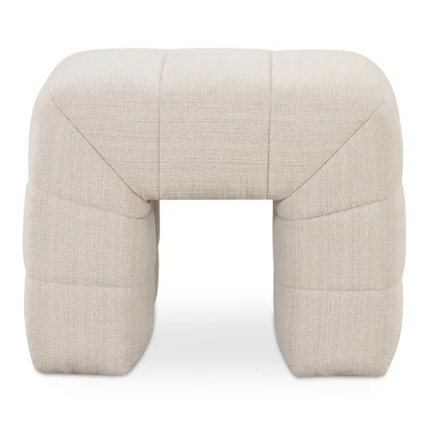 Plump Verity stool with wide channel detailing in soft flecked beige upholstery