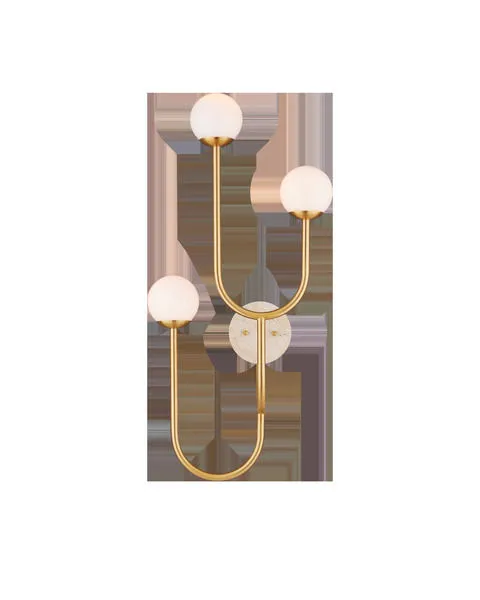 Highsmith Wall Sconce with three milk glass globes on curved brass stems and a round travertine wall plate