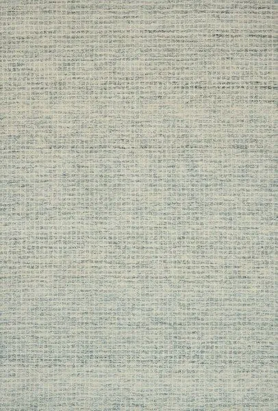 Giana Spa Rug with a relaxed grid pattern in soft blue and beige wool for a textured, watercolor-inspired look