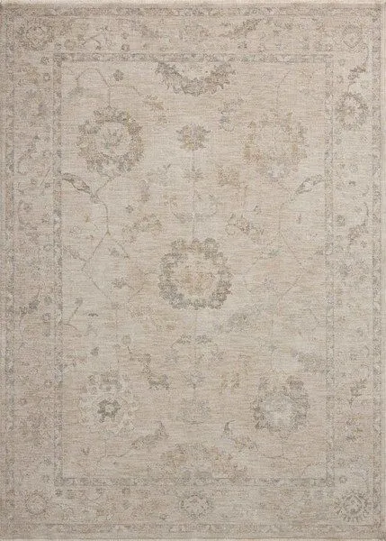 Traditional Turkish style area rug with pale blue, cream, and brown oatmeal and slate tones and soft pile texture
